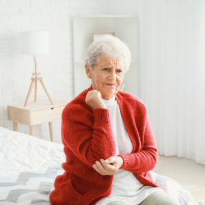 Older woman with elbow arthritis