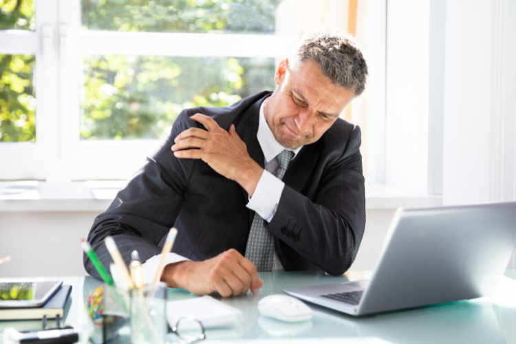 Acromioclavicular Joint Arthritis Man holding shoulder in pain